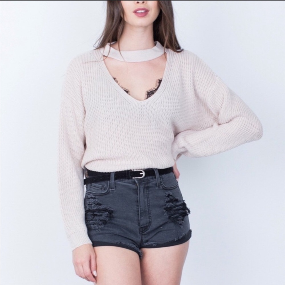 Sweater with cut out v-neck